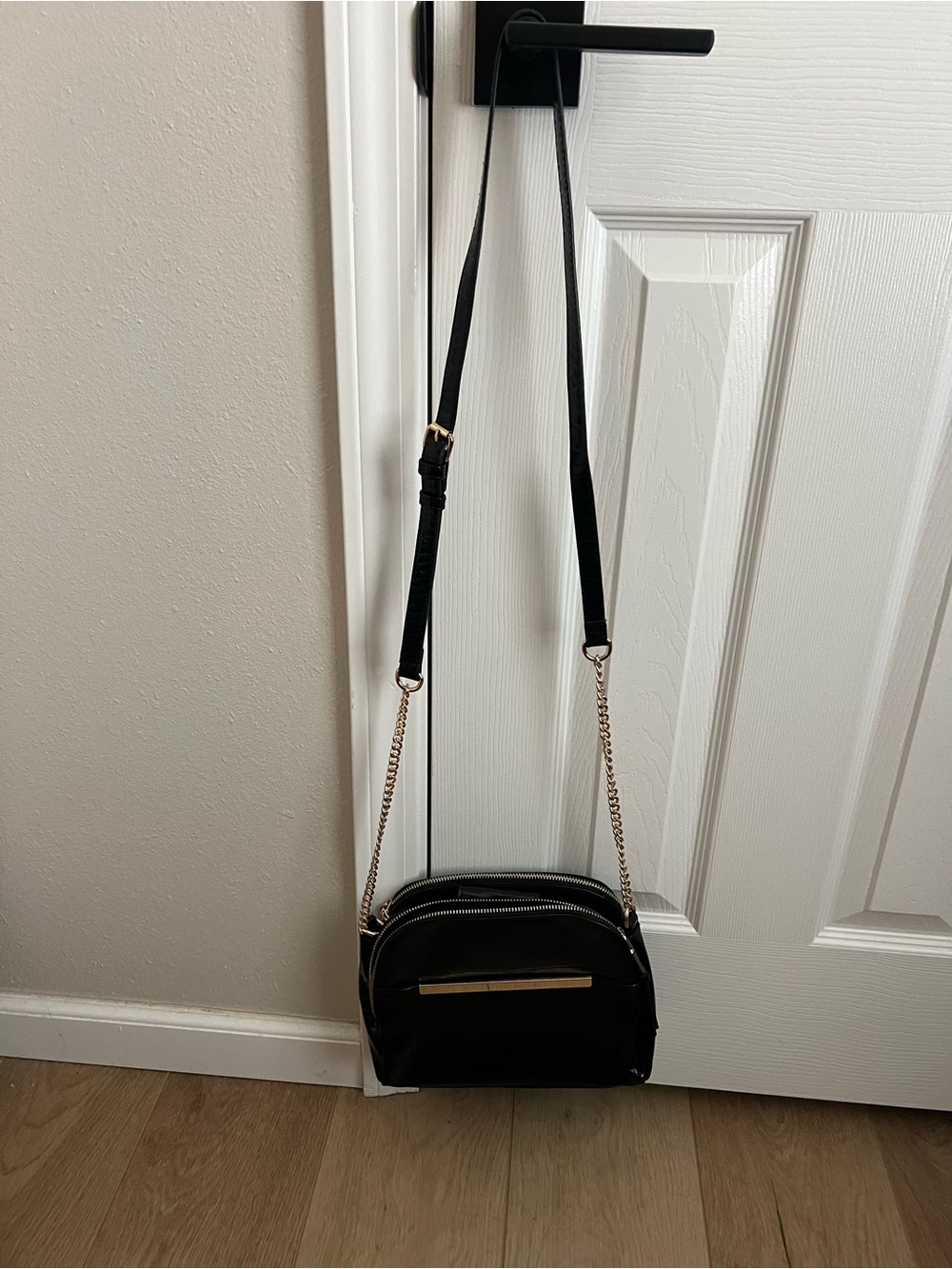 Black Crossbody Bag with Gold Chain Accent
